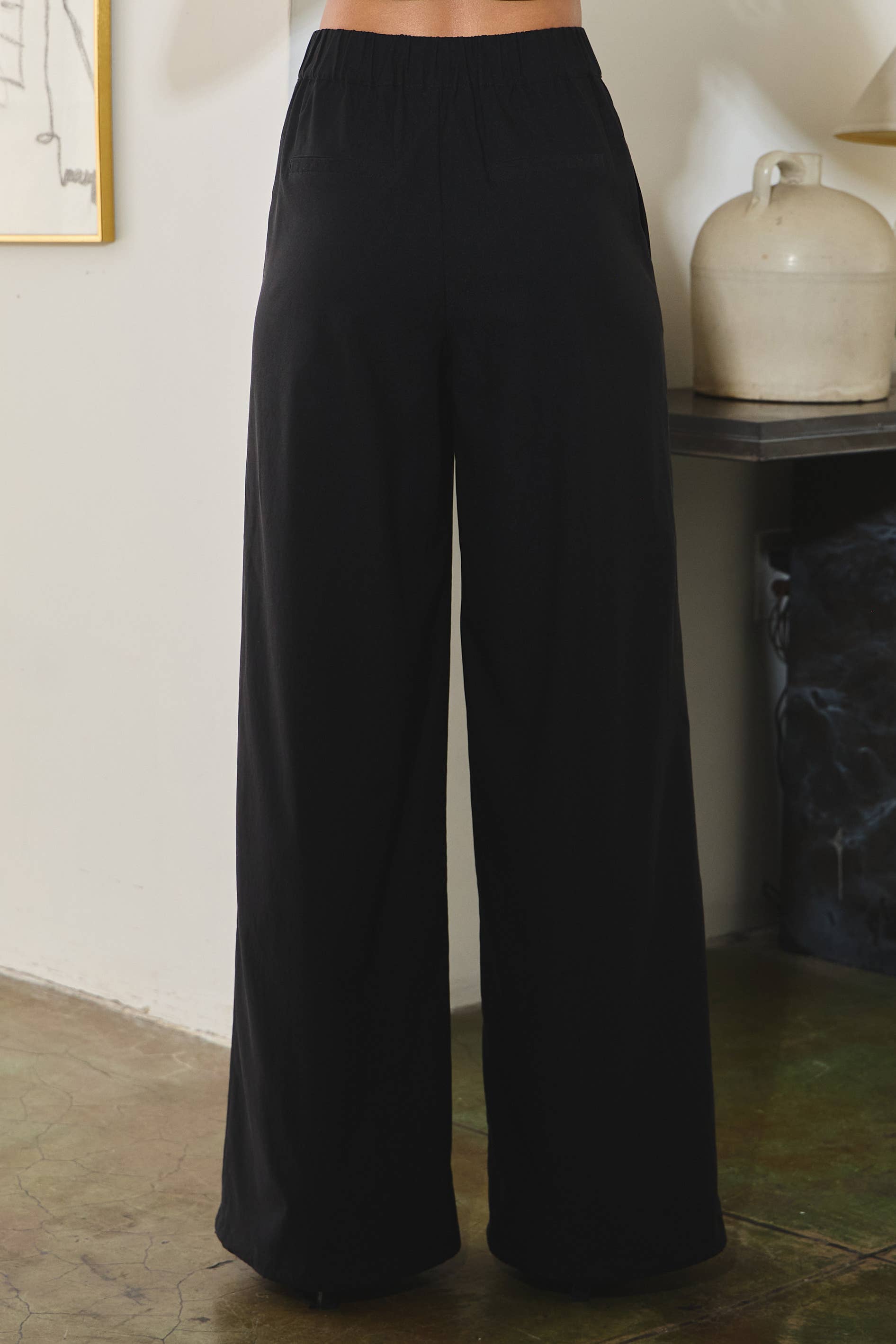 Image of Stretchy woven pin-tuck wide legged pants