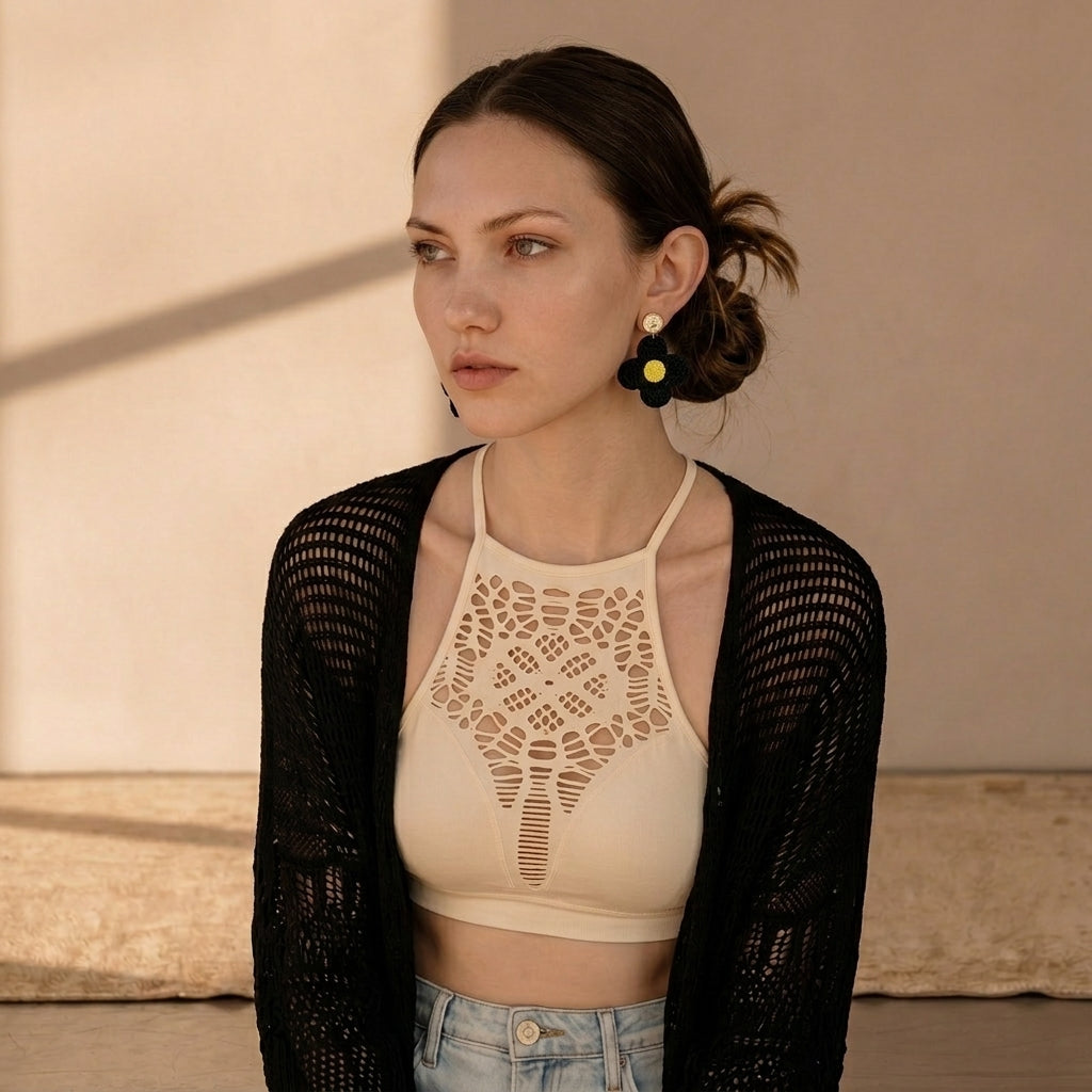Image of A woman wearing boho style black daisy sunflower Crochet Sunflower Earrings