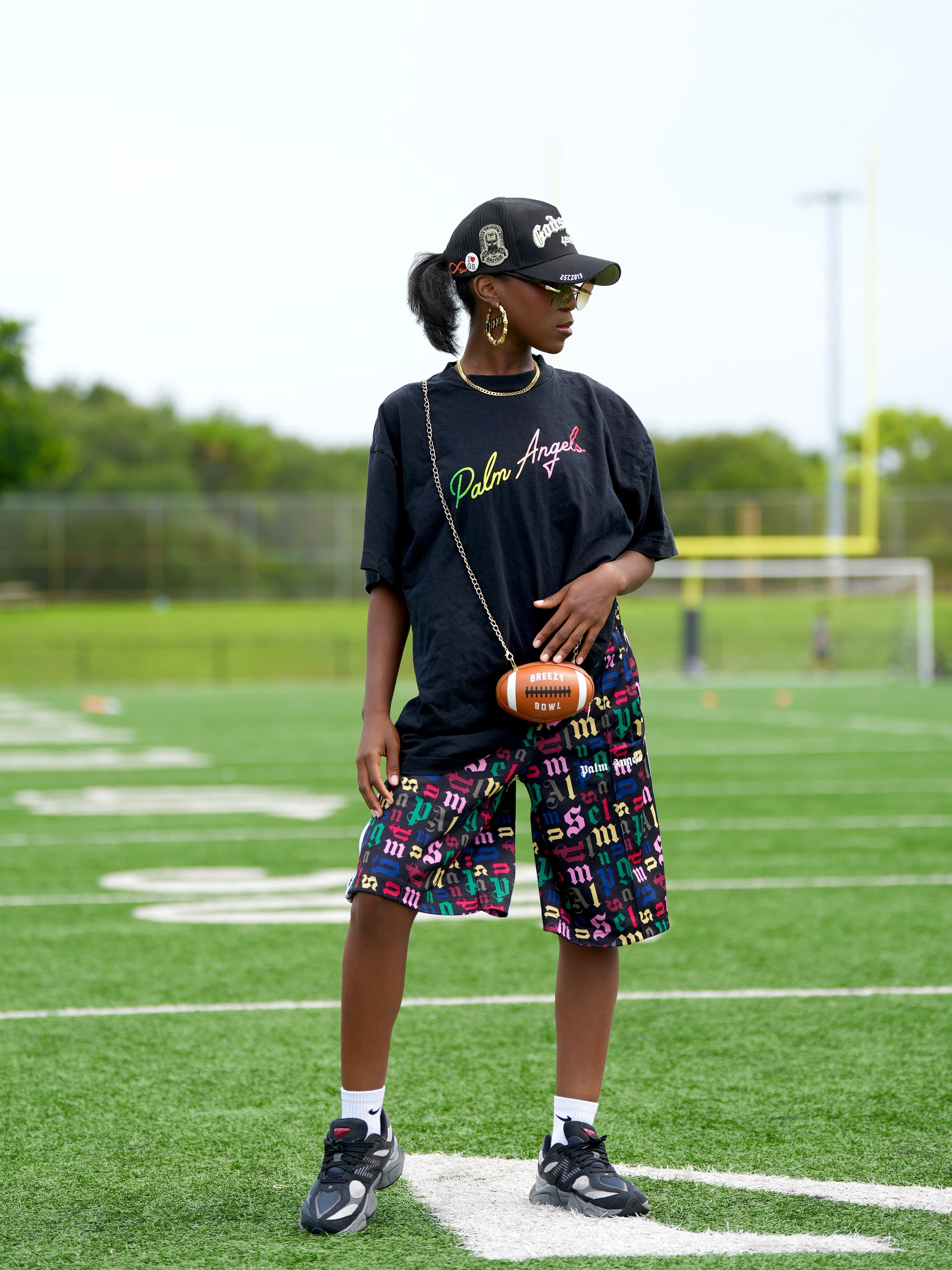 Image of Breezy Football Shaped Clutch Purse
