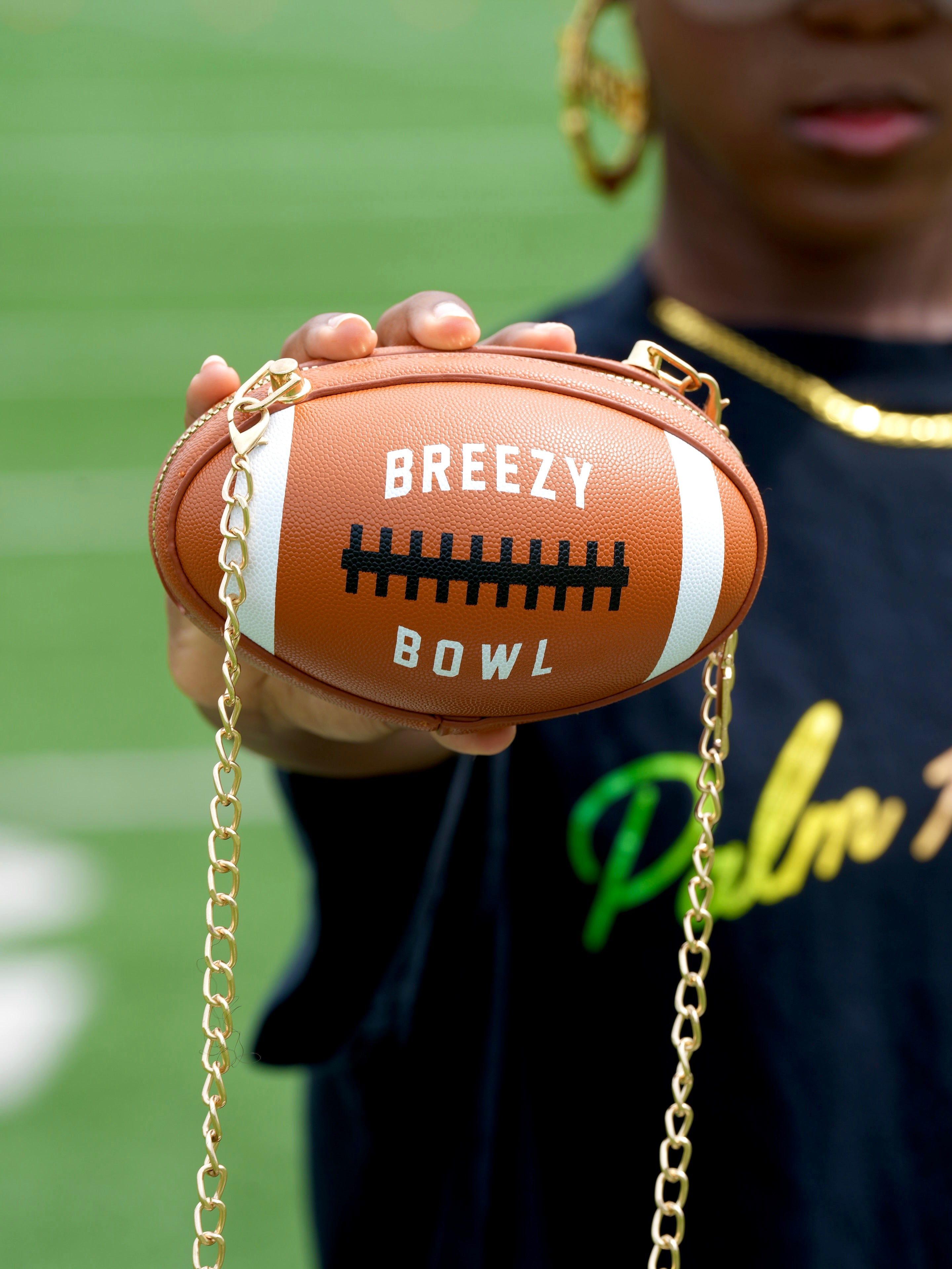 Image of Breezy Football Shaped Clutch Purse