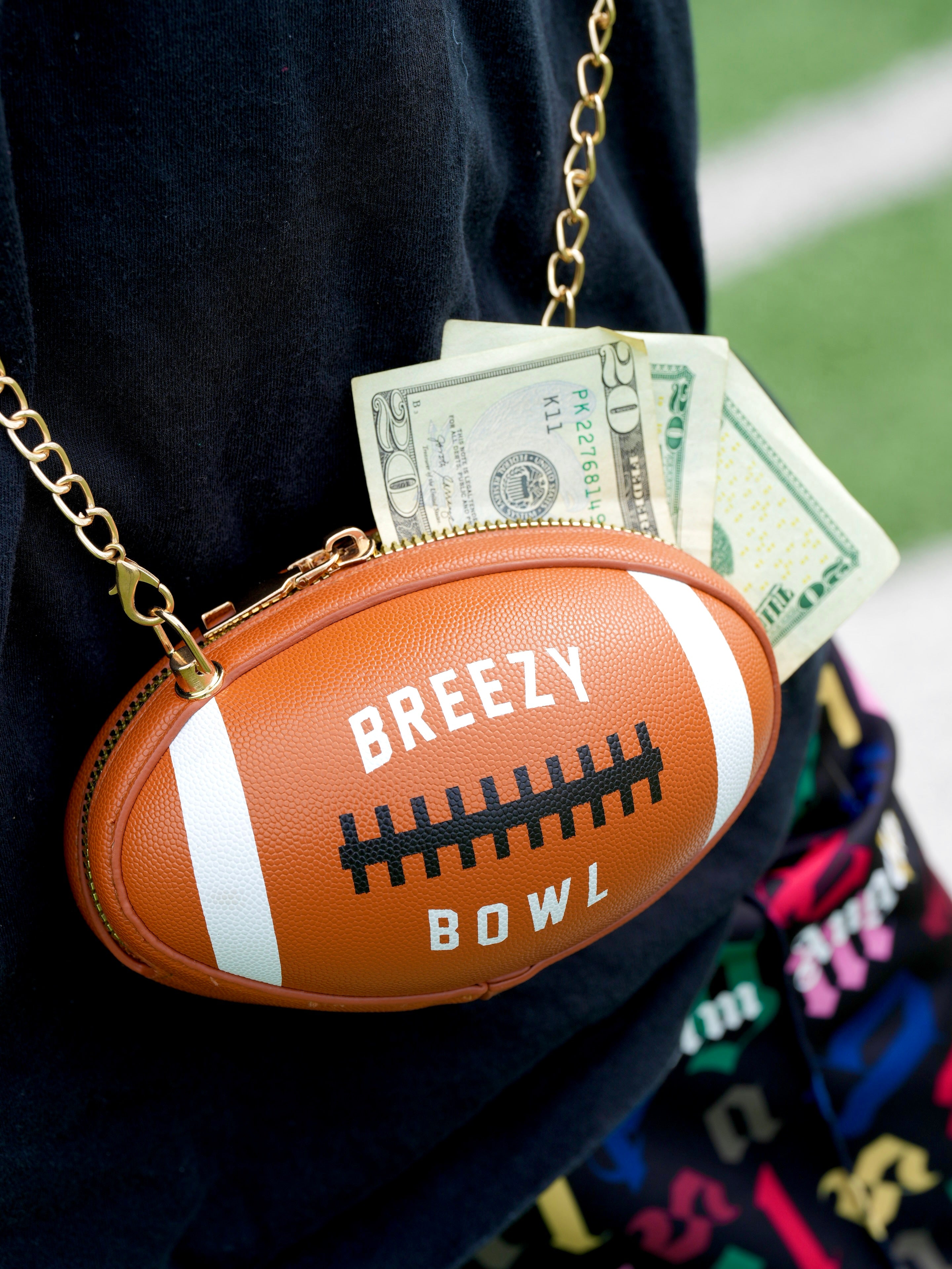 Image of Breezy Football Shaped Clutch Purse