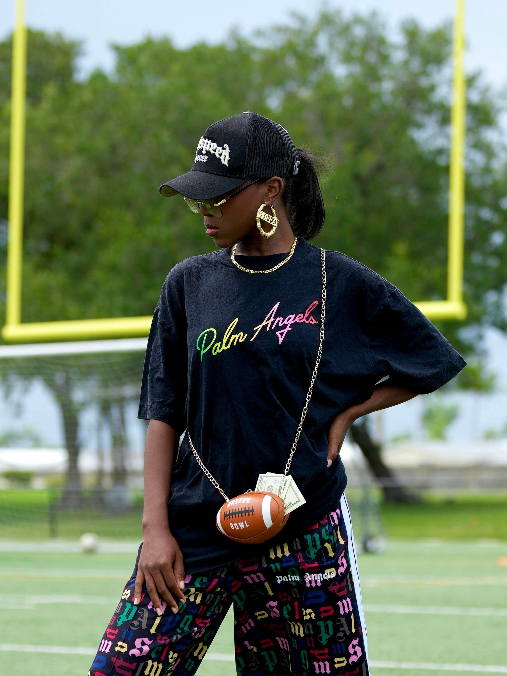 Image of Breezy Football Shaped Clutch Purse