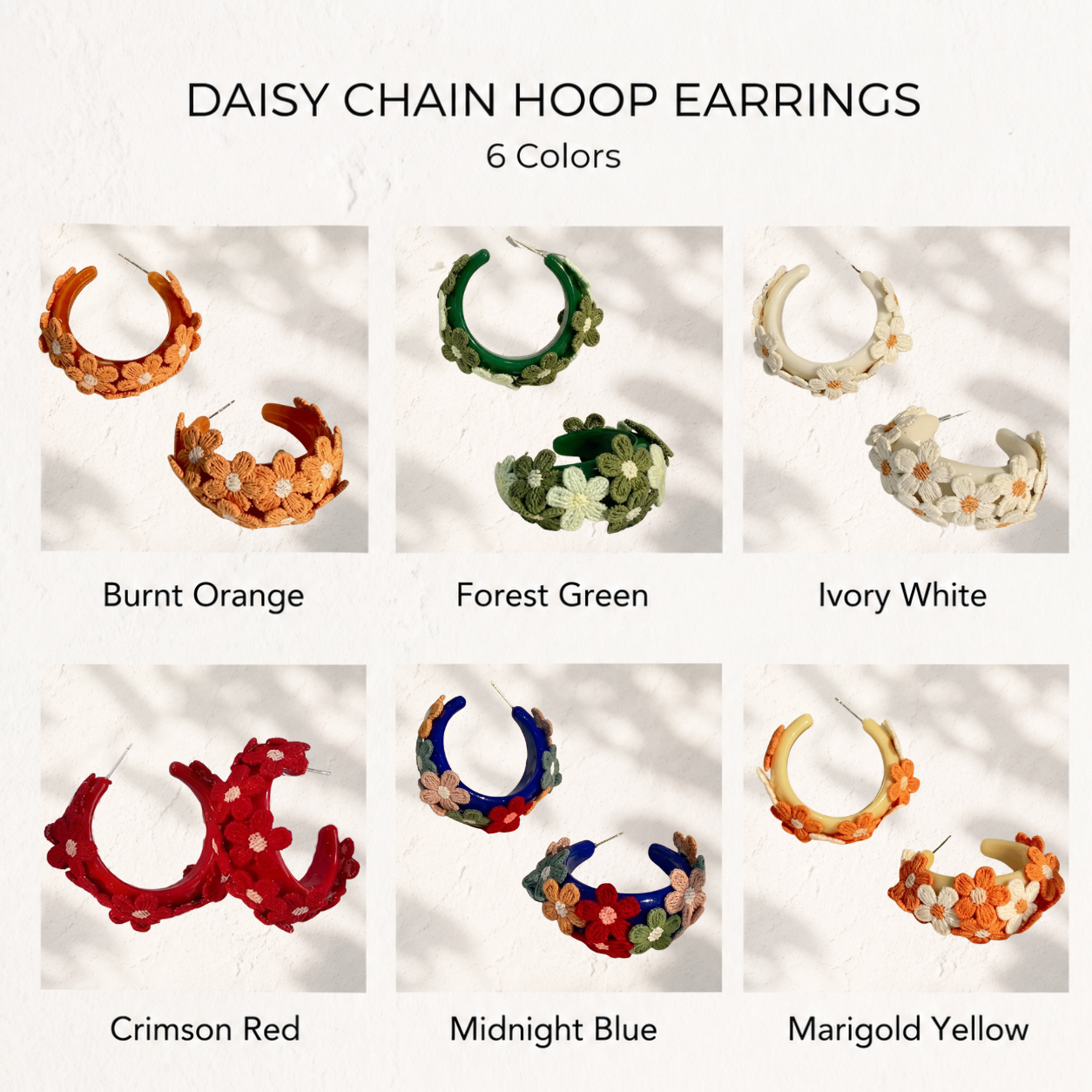 Image of Embroidered daisy hoop earrings shown in six colorways — Ivory White, Crimson Red, Midnight Blue, Marigold Yellow, Burnt Orange, and Forest Green