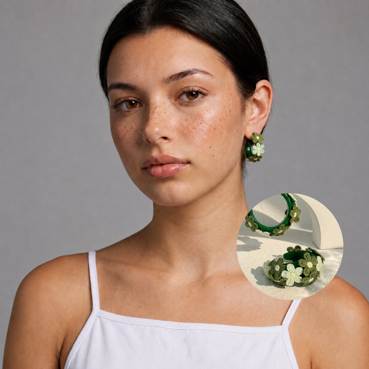 Image of Woman wearing Forest Green embroidered daisy hoop earrings, front view, studio background
