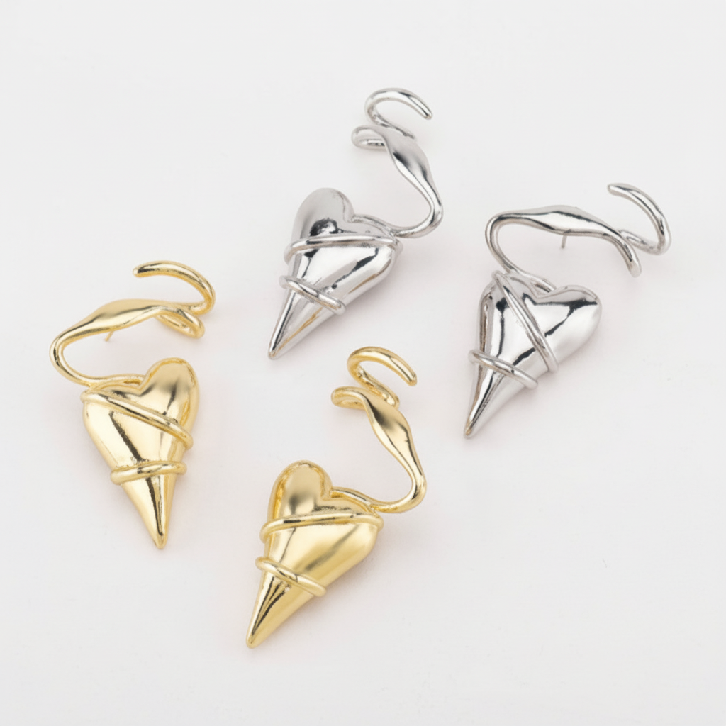 Image of Baby Girl Sculptural Drop Earrings | 90s Music Era