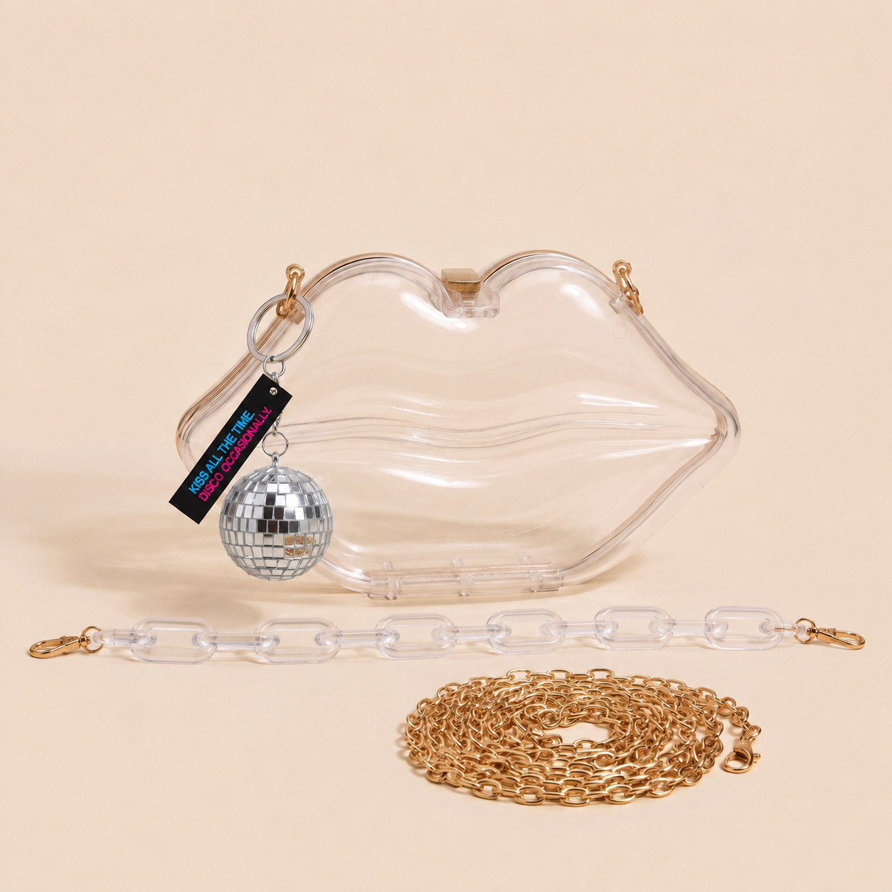 Image of Clear Kiss Purse laid flat showing gold-tone chain strap