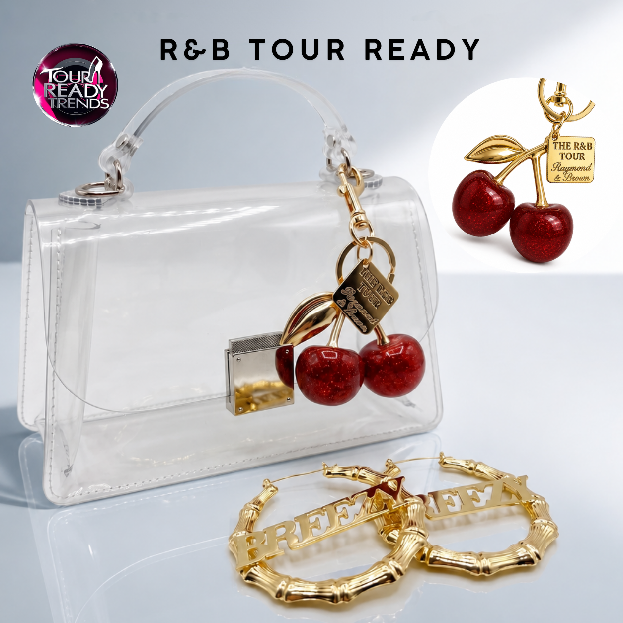 Image of Clear crossbody stadium bag with red cherry charm and gold Breezy bamboo hoop earrings, R&B Tour bundle